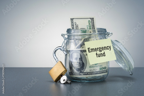 Emergency fund in the glass jar with cash.