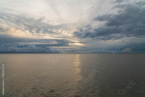 View of the Black Sea on the coast of Sochi against the sunset sky, Sochi, Krasnodar Krai, Russia