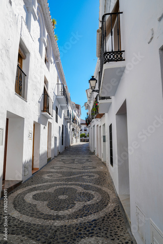 Narrow mosaic alleyway  in Frigiliana Spain