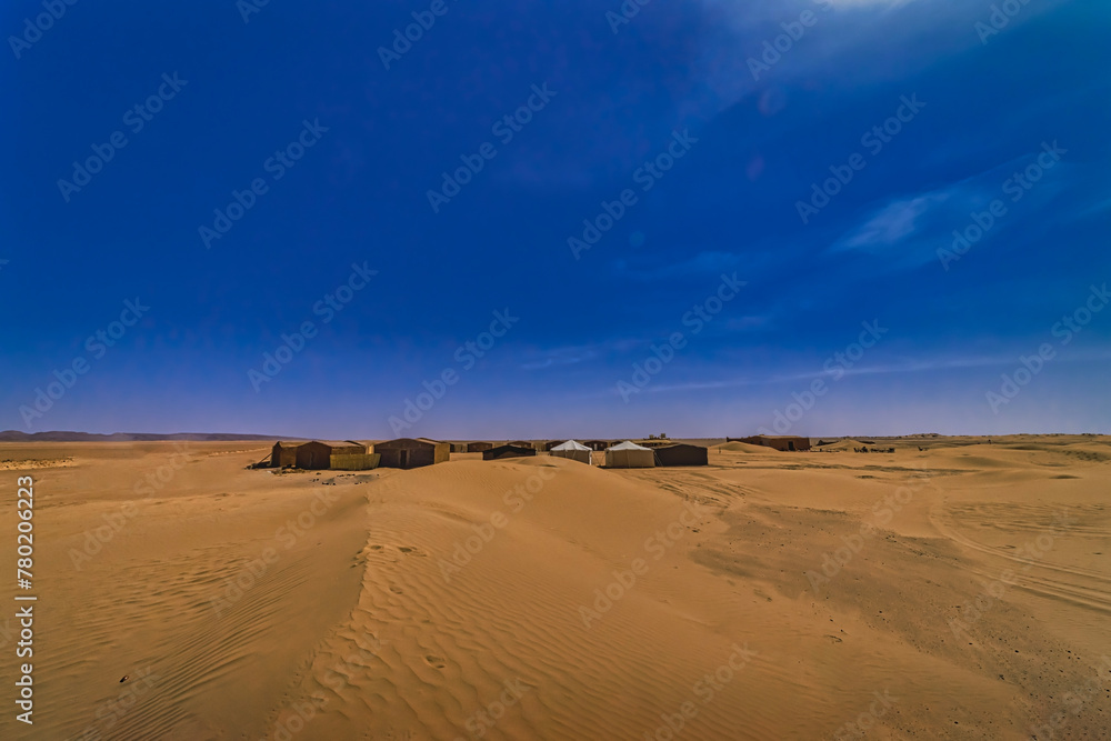 A panoramic sand dune near the desert camp at Mhamid el Ghizlane in Morocco wide A panoramic sand dune near the desert camp at Mhamid el Ghizlane in Morocco wide