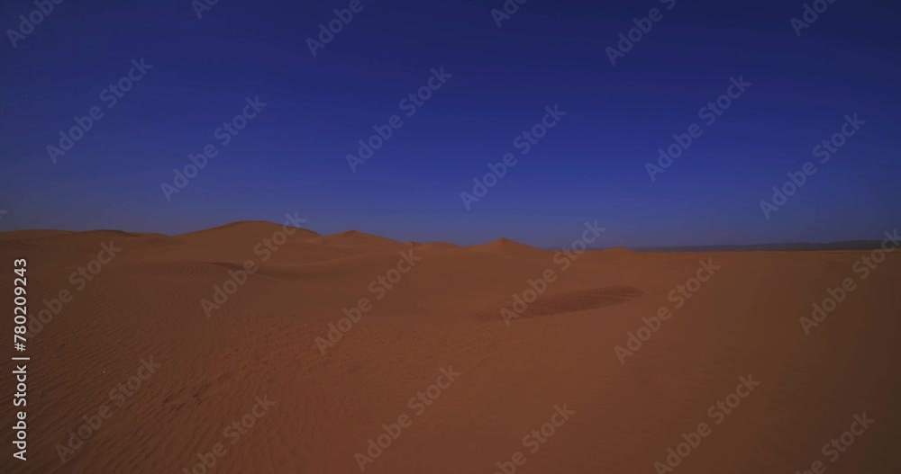 A panoramic sand dune of sahara desert at Mhamid el Ghizlane in Morocco wide shot A panoramic sand dune of sahara desert at Mhamid el Ghizlane in Morocco wide shot