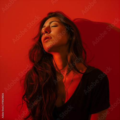 Pose a woman on a red background