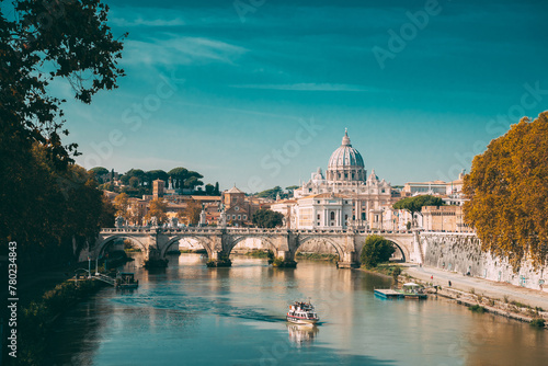 Rome, Italy. Papal Basilica Of St. Peter In The Vatican. Sightseeing Boat Floating Near Aelian Bridge. Touristic Boat