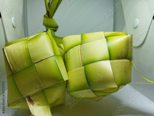 Typical foods that use ketupat include ketoprak, coto Makassar, lotek, kupat tofu, gado-gado which can be served with ketupat or lontong. photo
