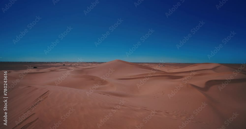 A panoramic sand dune of sahara desert at Mhamid el Ghizlane in Morocco wide shot A panoramic sand dune of sahara desert at Mhamid el Ghizlane in Morocco wide shot