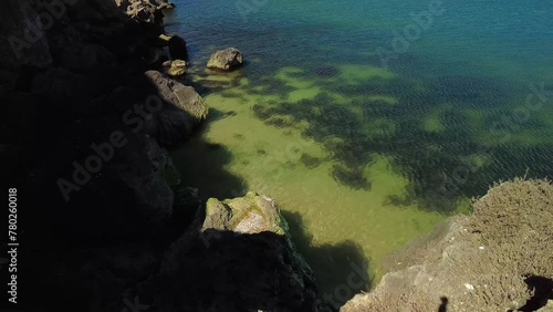 Wallpaper Mural captures tranquility beneath towering cliffs, where the Azov Sea exudes serenity. Experience peace amidst nature's embrace Torontodigital.ca