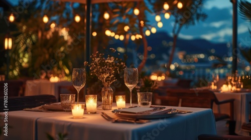 romantic dinner setting, featuring a beautifully arranged table with soft lighting and intimate decor