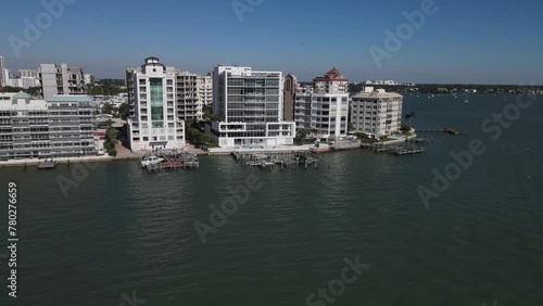 stunning orbiting aerial of Golden Gate Point, downtown Sarasota, Florida photo