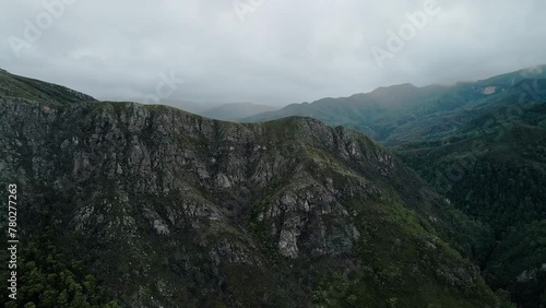 Rugged Mountains With Overcast Sky Over Tasmania's Franklin Gordon Wild Rivers National Park In Southwest, Australia. Aerial Shot photo