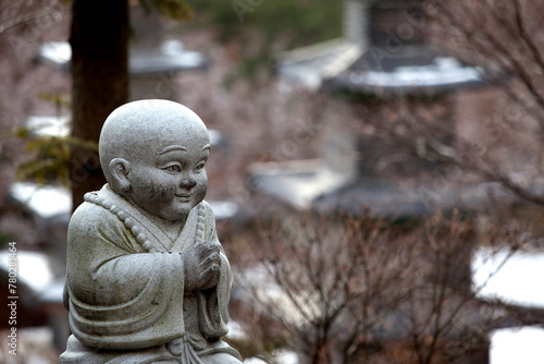 View of the monk statue in the Buddhist temple photo