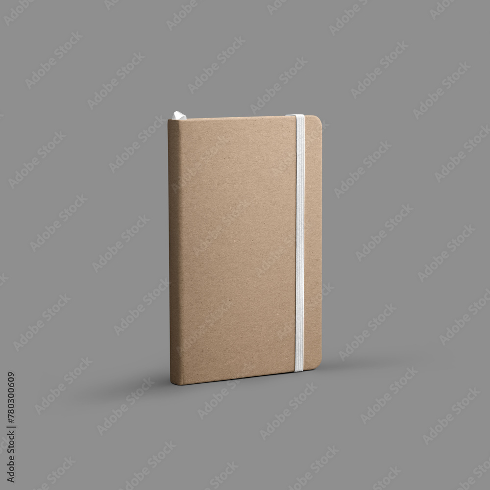 A template of a closed craft notebook with a bookmark, white band, stands on a gray background. A template of a closed craft notebook with a bookmark, white band, stands on a gray background.