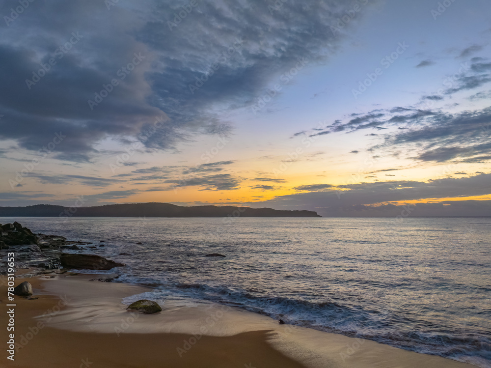 Obraz premium After the rain sunrise at the seaside