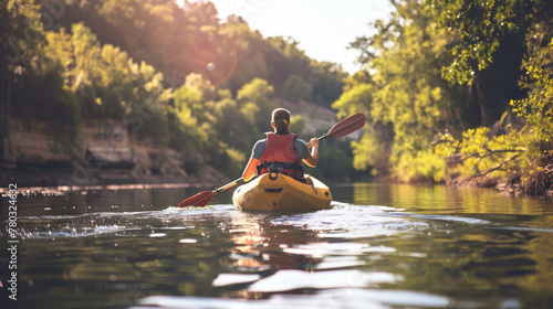 Outdoor adventurers crave the thrill of exploration, seeking out new trails, peaks, and waterways to conquer and conquer their fears with kayaking photo