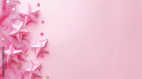 Pink shiny origami stars scattered on a textured background with copyspace © Natalia
