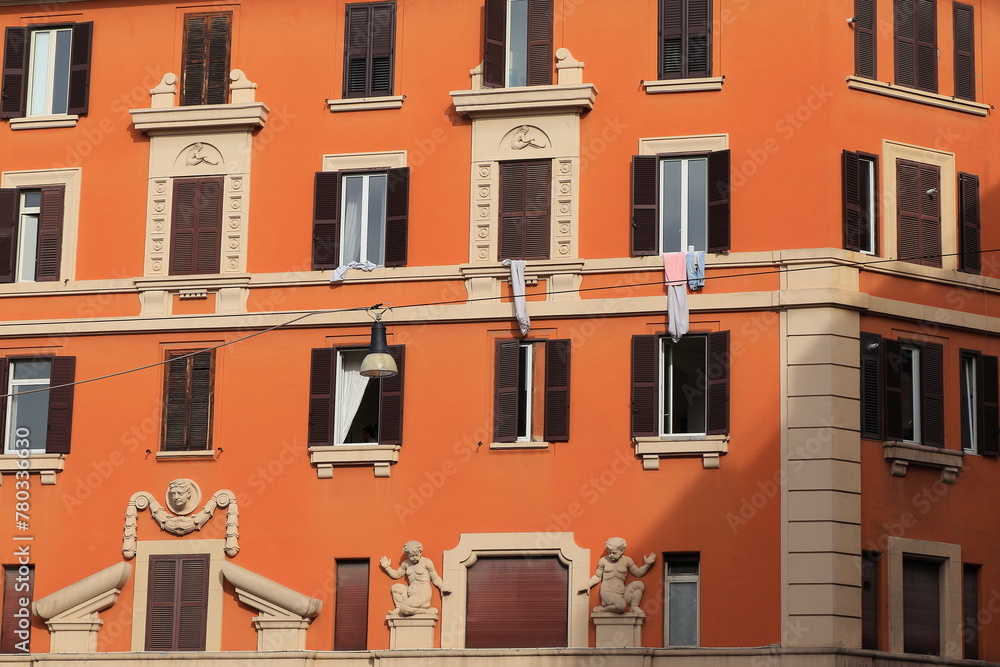 Piazza dei Sanniti Square Building Facade Detail with Hanging Laundry in Rome, Italy