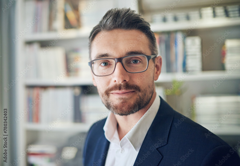 Fototapeta premium Portrait, serious and business man in office for career or job in workplace in Germany. Face, confidence and professional attorney in glasses, entrepreneur and corporate employee in suit at company