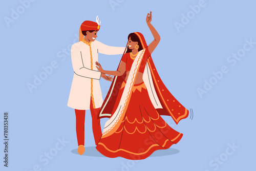 Indian couple dances wedding dance in national clothes, performing traditional rite of hindi culture. Wedding ceremony of indian bride and groom rejoicing in creation of new family