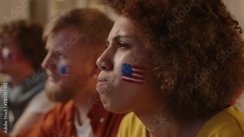 American football fans watching soccer match on tv and drinking beer , cheering for USA team. World Soccer Cup 2026 USA, Canada, Mexico. Football, sports and soccer fans. Slow Motion