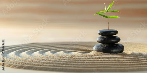 A serene Zen garden with circular raked sand patterns, with  black stones stacked  with small bamboo ,Stacked zen stones sand, spa, calm