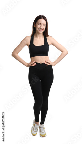 Happy young woman with slim body posing on white background © New Africa