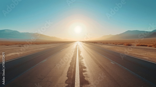 Straight road to further destination, morning desert landscape, concept of travel