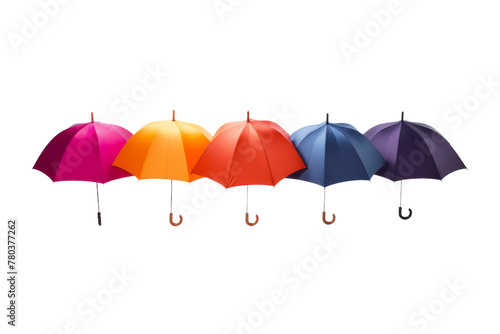 Rows of Multicolored Umbrellas Hanging From Hooks. On a White or Clear Surface PNG Transparent Background.