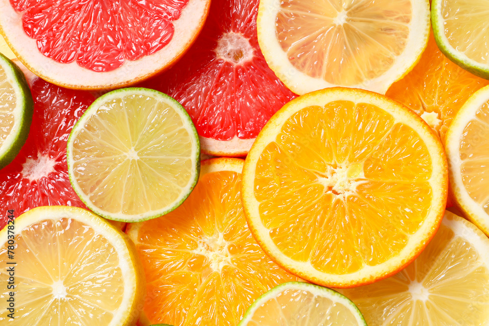 Different sliced citrus fruits as background, top view Different sliced citrus fruits as background, top view
