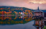 Calm autumn scene of Grundlsee lake. Perfect morning view of Brauhof village, Styria stare of Austria, Europe. Colorful sunrise on Austrian Alps. Traveling concept background.