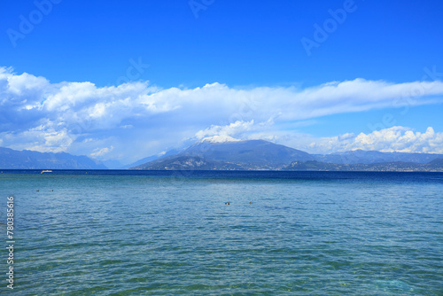 Lago di Garda  view to the lake and Alps covered with snow in background  Italy