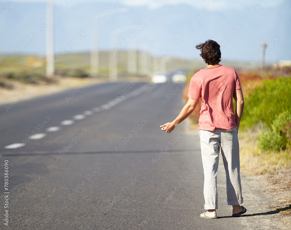 Man, highway and hiking for getaway outside for road trip, vacation and adventure for travel. Male person, walking and vehicle problems outside for vacation, thumbs up and long journey on roadside. Man, highway and hiking for getaway outside for road trip, vacation and adventure for travel. Male person, walking and vehicle problems outside for vacation, thumbs up and long journey on roadside.