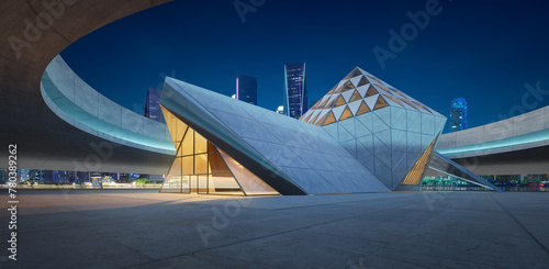3D Modern architecture in the urban landscape at dusk with contemporary design and futuristic structures