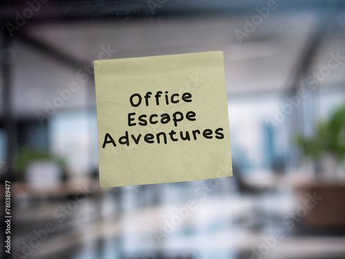 Post note on glass with 'Office Escape Adventures'.