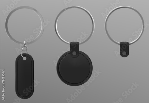 Set of black leather keychains isolated on background. Vector realistic illustration of oval and round shape blank fob on silver metal ring, souvenir pendant mockup with space for branding, accessory