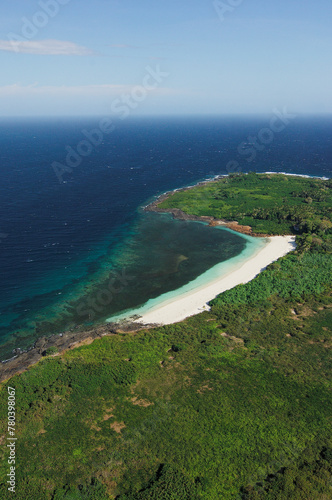 Aerial view of palms and sandy beach at Iguana island, A place for snorkeling, scuba diving, kayaking, swimming, Los Santos province, Panama - stock photo 