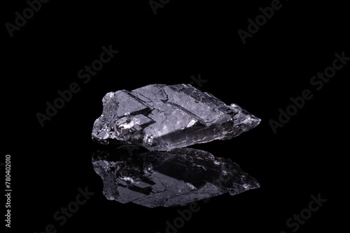 grey Gypsum from France, photography isolated on black background. macro detail close-up rough raw unpolished semi-precious gemstone. 