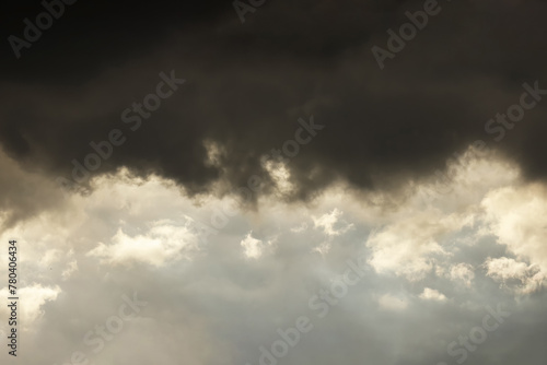 Image of black storm clouds before thunderstorm. Image use of meteorology forecast presentation and report background.