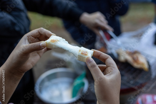 Selective focus Yakimochi grilled on charcoal grill Looks delicious in the winter when you need warmth. photo