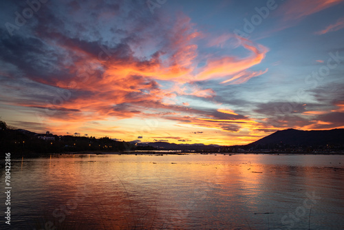 scenic sunset with clouds in winter over txingudi bay in hendaye photo