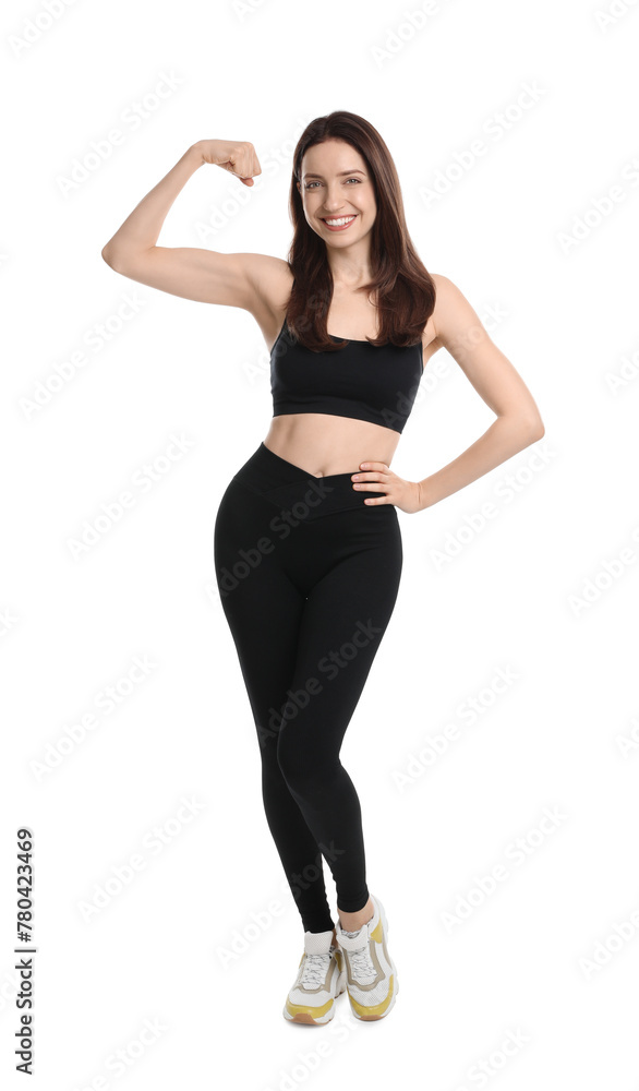 Happy young woman with slim body showing muscles on white background - obrazy, fototapety, plakaty 