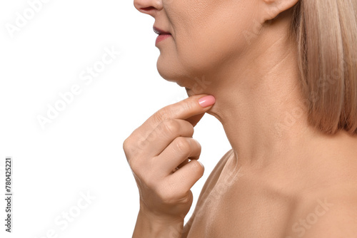Woman touching her neck on white background  closeup