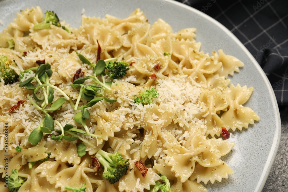Vegetarian meal. Tasty pasta with fresh vegetables and cheese on table, closeup Vegetarian meal. Tasty pasta with fresh vegetables and cheese on table, closeup