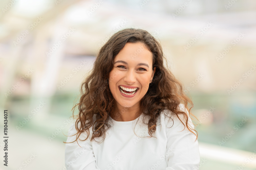 Radiant Beautiful Woman Laughing At Camera While Standing At Airport Radiant Beautiful Woman Laughing At Camera While Standing At Airport