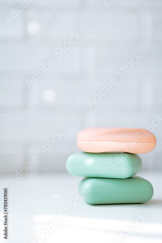 soap bars in foam on a light background, hand cleansing