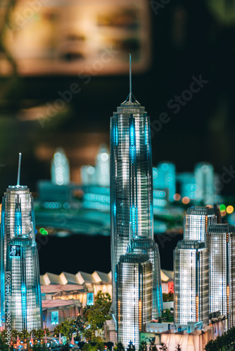 Closeup shot of glass maquette of Warisan Merdeka Tower Skyscraper in Kuala Lumpur, Malaysia photo