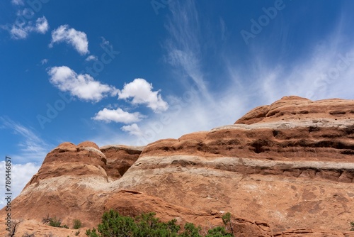 Rock formation mountain at the Arches National Park with blue cloudy sky in Utah - USA