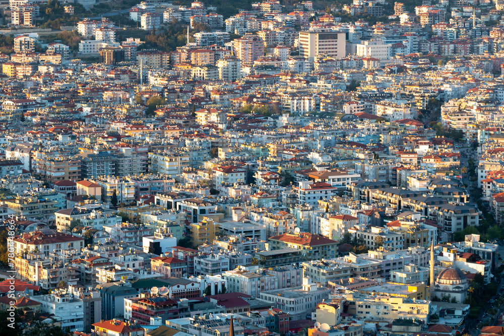 Panoramic view from Alanya Castle on city Buildings during sunset