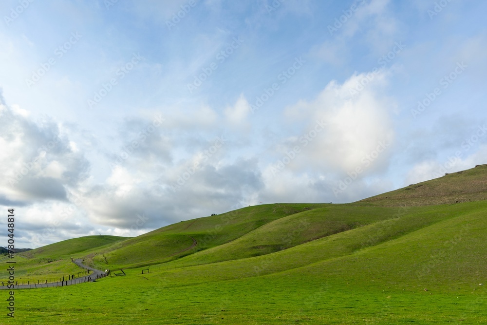 Beautiful view of green hills under a blue sky