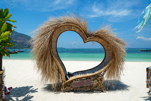 Fototapeta Naklejka Na Ścianę i Meble -  Relax on the island,Heart seat at the beach on the island during the day,koh lipe