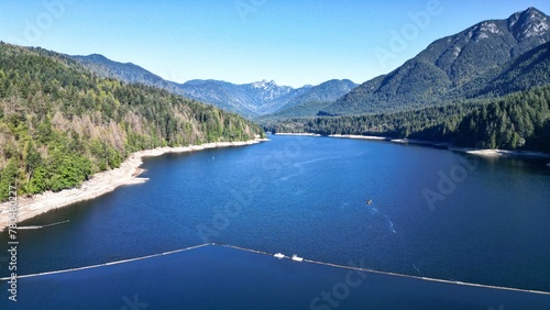 Beautiful view of Capilano Lake near the mountains in British Columbia  Canada