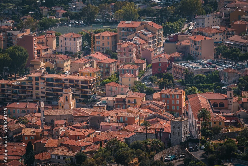 Aerial view of a town with tall building houses